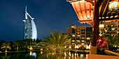 Dubai Jumeirah beach, Burj al Arab, Medinat Jumeirah, Bari bar terasse in the evening