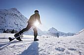 Cross-country skier in Paznaun valley, near Galtuer, Tyrol, Austria