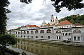 Houses at the river under clouded sky, Ljubljana, Slovenia, Europe