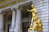 Golden statue in front of Dramaten, Stockholm, Sweden