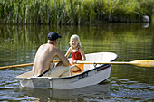 Man and girl in row boat (MR)