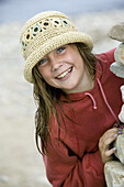 Happy girl with straw hat