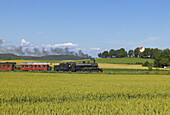 Train passing grainfields