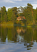Red house near lake