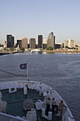 Bow of cruiseship MS Deutschland (Deilmann Cruises) and city skyline, Buenos Aires, Argentina, South America, America