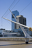 Bridge and buildings seen from Puerto Madero docks district, Buenos Aires, Argentina, South America, America