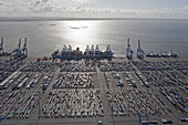 Aerial view of the container port, Containers and loading cranes in the backlight, Bremerhaven, northern Germany