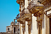 Baroque balcony, Palazzo Nicolai, Noto, Sicily, Italy