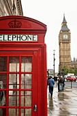 Phone booth with Big Ben in the background, Bridge Street, London, England, Europe