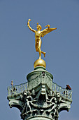 Génie de la Liberté statue on the top of the July Column in Place de la Bastille, Paris, France