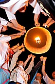 People lightning lanterns during Loi Krathong festival in Chiang Mai Thailand