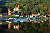 View over Main river to Miltenberg with church and Mildenburg castle, Main river, Odenwald, Spessart, Franconia, Bavaria, Germany