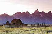 Historic Barn on Mormon Row and Teton Mountain Range, Grand Teton National Park, Wyoming, USA