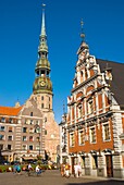 Rätslaukums square with St Peters church and House of Blackheads in old town Riga Latvia Europe