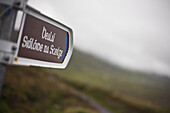 Gaelic writing on the road sign, Valentia Island, Iveragh Peninsula, Ring of Kerry, County Kerry, Ireland