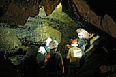 People visiting Gruta do Carvao lava tube cave  Sao Miguel island, Azores islands, Portugal