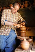 Mr  João da Rita making traditional azorean pottery ´loiça da Vila´ in Vila Franca do Campo  Sao Miguel island, Azores, Portugal