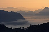 Aerial view, Aerial views, Asia, Borneo, Borneo highland, Coast, Coastal, Color, Colour, Daytime, Ecosystem, Ecosystems, Exterior, Fog, From above, Highland, Landscape, Landscapes, Malaysia, Mist, Mood, Morning, Morning view, Mountain, Mountains, Mysterio