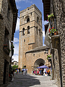 Bell tower and main façade of the Romanesque collegiate church of Santa Maria  12th century), Ainsa. Sobrarbe, Huesca province, Aragon, Spain
