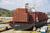 Container ship in Miraflores Locks, Panama Canal, Panama