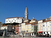 The main square of Piran in southern Slovenia with the Church of St George above