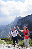 Mountain hikers ascending, Salzburger Hochthron, Untersberg, Berchtesgaden Alps, Berchtesgaden, Upper Bavaria, Bavaria, Germany