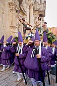Good Friday procession with float by Baroque sculptor Francisco Salzillo passing by cathedral, Murcia, Spain