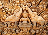 Cambodia - The temple of Banteay Srei is known for the exquisite exuberance of its sandstone carvings It is located about 25km northeast of the main group of temples in Angkor The temple complexes of Angkorcity,  were the heart of the Khmer empire whic