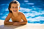 Little caucasian girl in the swimming pool