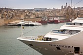 Malta, Valletta, Floriana, cruiseship at Pinto Wharf and view towards Senglea