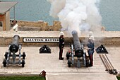 Malta, Valletta, Saluting Battery, elevated view from Upper Barrakka Gardens, soldiers by the noonday gun