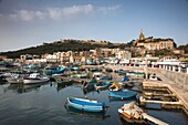 Malta, Gozo Island, Mgarr, harbor view with traditional luzzu fishing boats