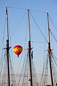 Finland, Helsinki, Katajanokka Island marina and hot air balloon, dusk