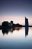 Latvia, Riga, modern architecture on the west bank of the Daugava River, dusk