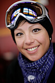 Female free skier smiling at camera, British Columbia, Canada