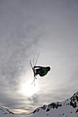 Freeskier during jump, Stubai glacier, Stubai Alps, Tyrol, Austria, Europe