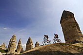 Mountainbiker in the Love Valley, Guevercinlik valley, Goereme, Goereme, Cappadocia, Turkey