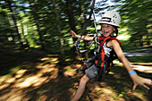 Child at high ropes course at Maserer Pass, Reit im Winkl, Chiemgau, Upper Bavaria, Bavaria, Germany, Europe