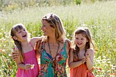 Caucasian ethnicity, child, childhood, Female, field, flower, girl, kid, spring, young, youth, F57-1149194, AGEFOTOSTOCK