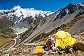 Trampers campsite on Mt Wakefield, Mt Sefton Mueller lake and Hooker river behind, Mount Cook National Park, Canterbury, New Zealand