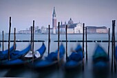 Gondolas and San Giorgio Maggiore in background Venice Italy