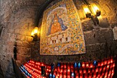 Votive candles in the Montserrat sanctuary, Catalonia, Spain