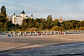 Sandy beach with roofed wicker beach chairs, Baltic sea spa Zinnowitz, Usedom, Mecklenburg-Vorpommern, Germany