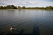 Girl swimming in lake Beetzsee, Brandenburg an der Havel, Brandenburg, Germany