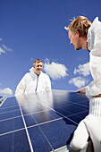 Technicians installing a photovoltaic power plant, Hamburg, Germany