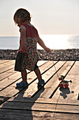 Little Girl Playing On The Boardwalk, Somme (80), Picardy, France