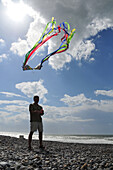 A Man Flying A Kite On The Beach, Somme (80), Picardy, France