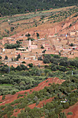 Red Earthen Houses In The Berber Village Of Oughal, Terres d'Amanar, Al Haouz, Morocco