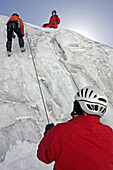 Climbing An Ice Cascade With Crampons And Ice Axes. Survival Course For Helicopter Pilots Of The Civil Emergency Services, La Meije Lagrave (05), France