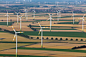 Aerial shot of wind farm on fields, Lower Saxony, Germany